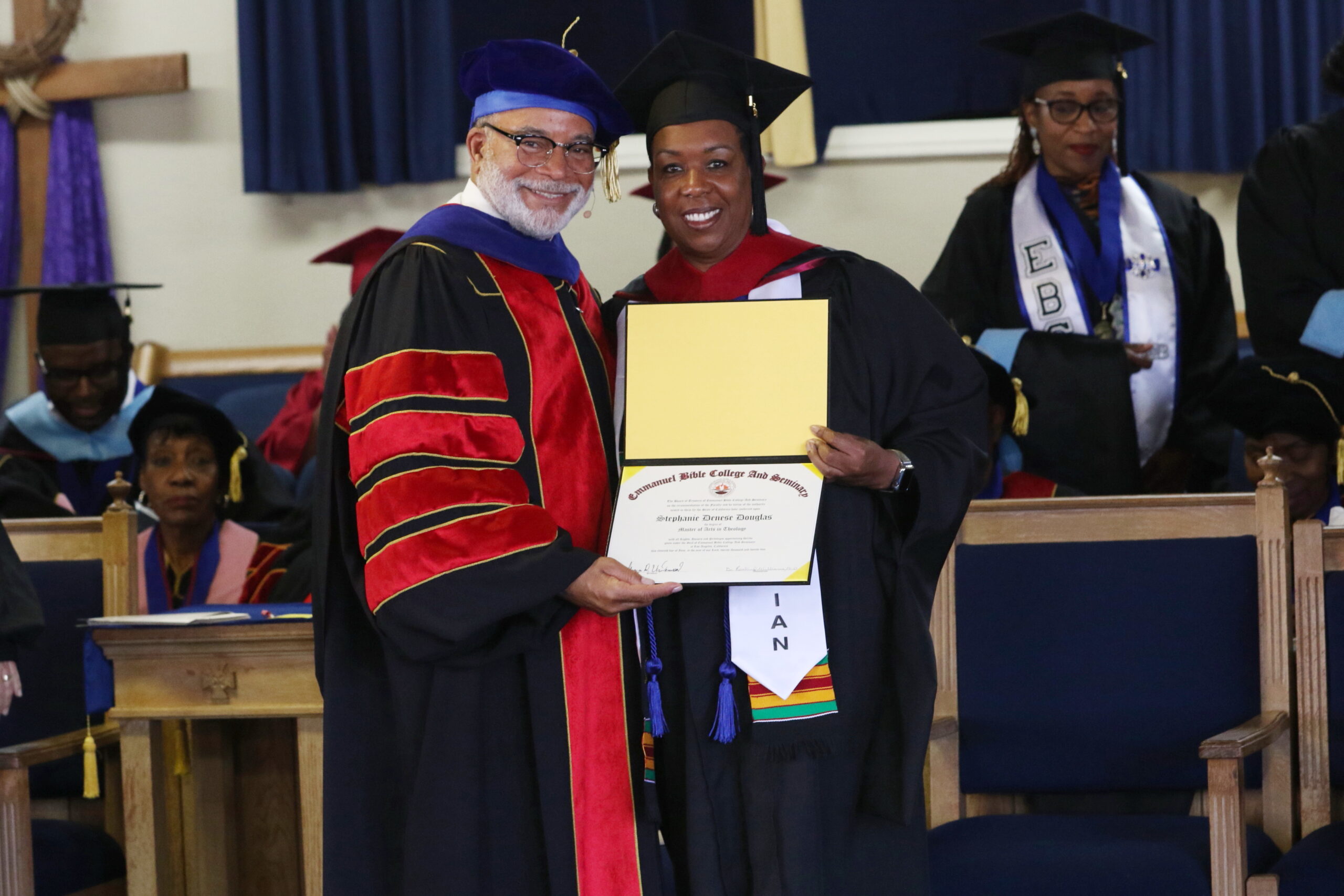 dr underwood pictured with graduate