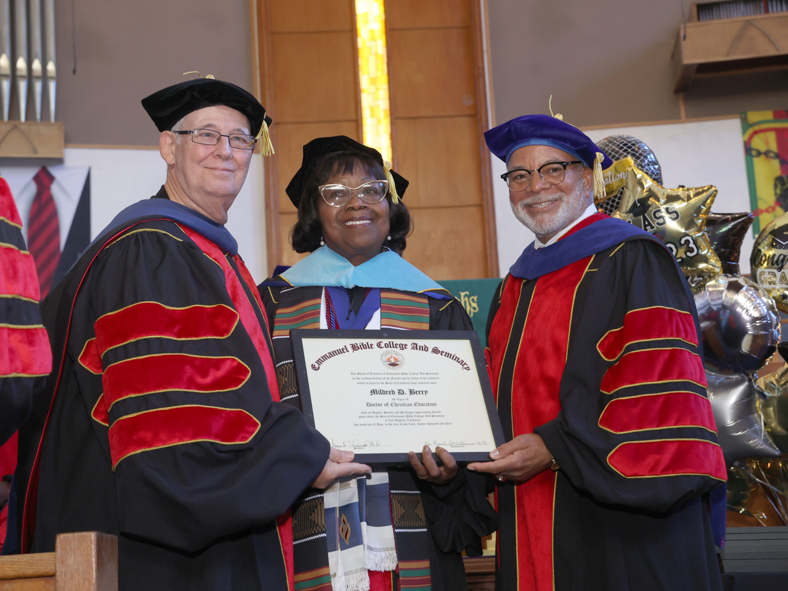 dr underwood and teacher with graduate