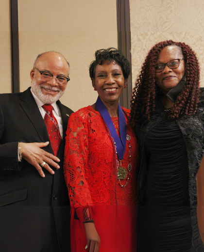 dr underwood and dr rosalind pictured with an alumni