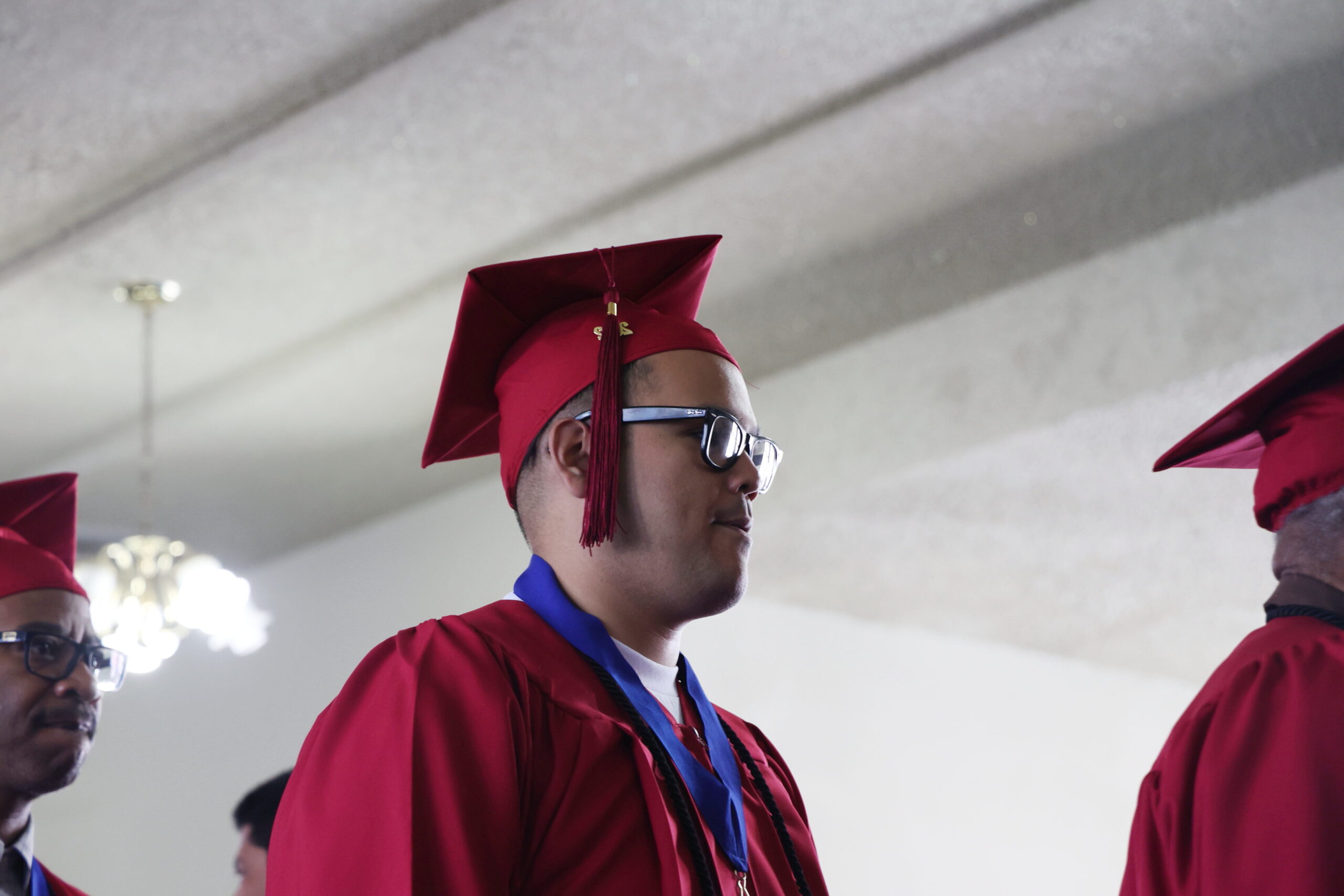 man in graduation cap and gown