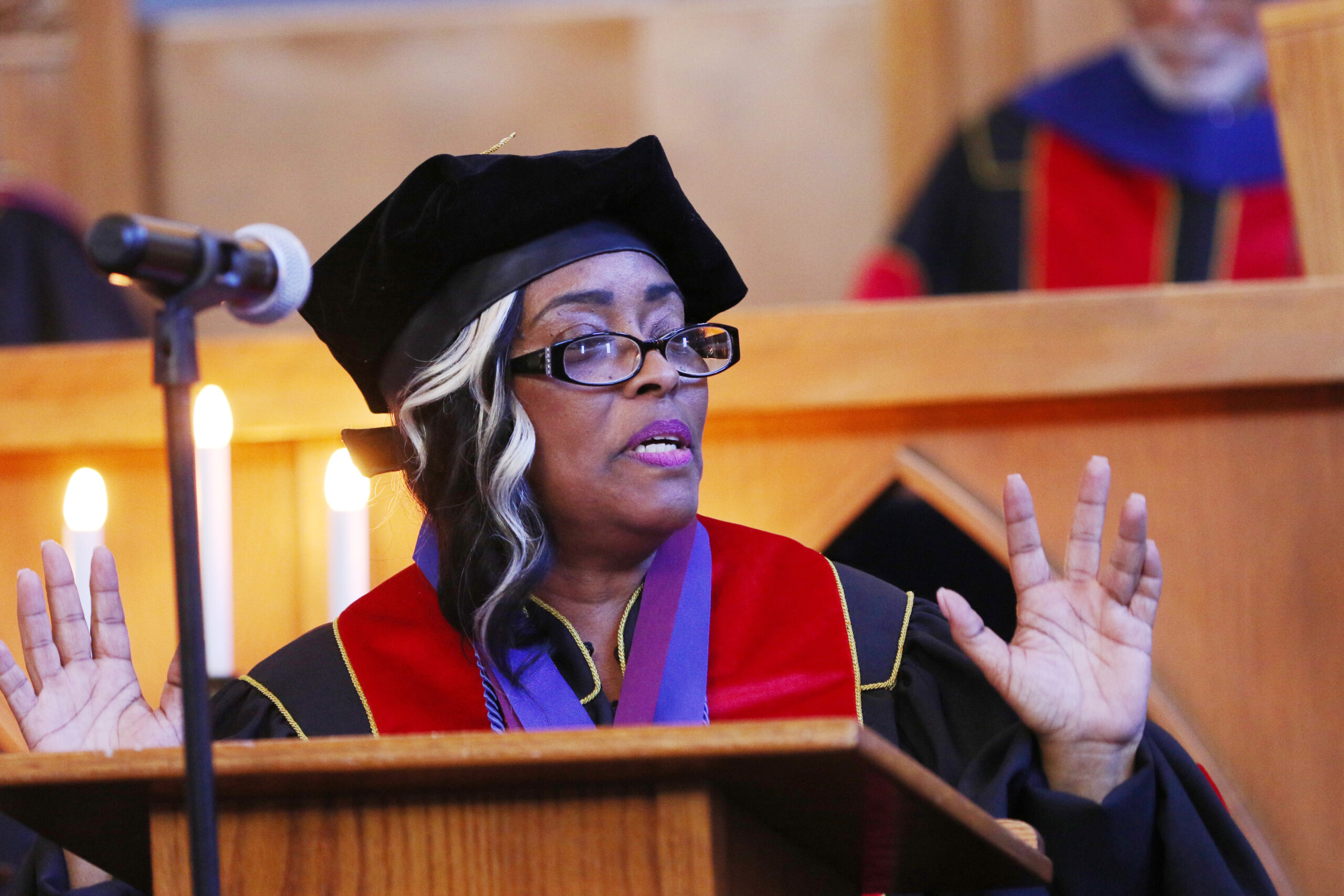 woman speaking at graduation